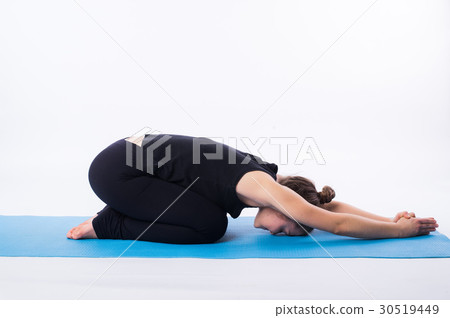 Beautiful sporty fit yogini woman practices yoga Beautiful sporty fit yogini woman practices yoga 30519449