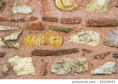 Background of an old stone brick wall close-up Background of an old stone brick wall close-up 30520041