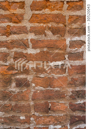 Background of an old stone brick wall close-up Background of an old stone brick wall close-up 30520043