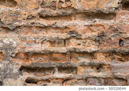 Background of an old stone brick wall close-up Background of an old stone brick wall close-up 30520044