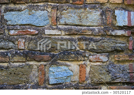 Background of an old stone brick wall close-up Background of an old stone brick wall close-up 30520117