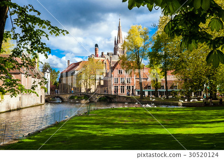 Bruges city view with houses, bridge and canal Bruges city view with houses, bridge and canal 30520124