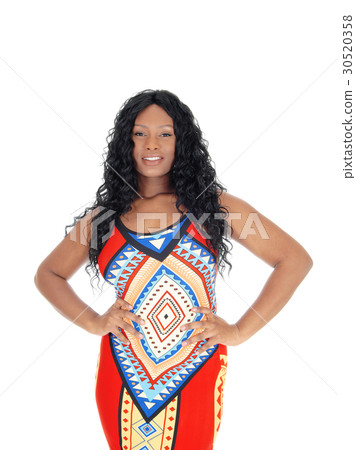 Beautiful African woman in colorful dress. Beautiful African woman in colorful dress. 30520358
