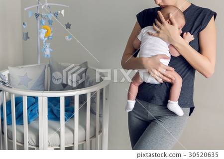 mother sleeping on the chest of his son mother sleeping on the chest of his son 30520635