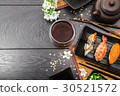 Sushi set sashimi and sushi rolls and flowers 30521572