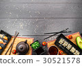 Sushi set sashimi and rolls on dark background 30521578