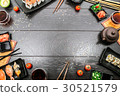 Sushi set sashimi and sushi rolls around table 30521579