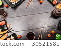 Sushi set sashimi and sushi rolls around table 30521581
