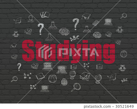 Learning concept: Studying on wall background Learning concept: Studying on wall background 30521649