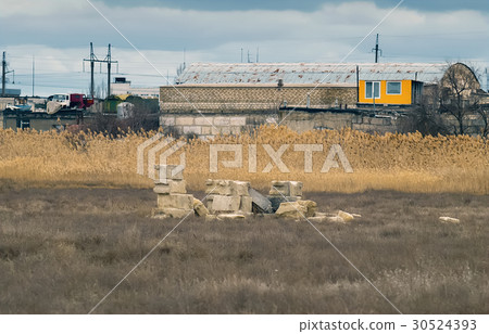 Building materials on field near the base 30524393