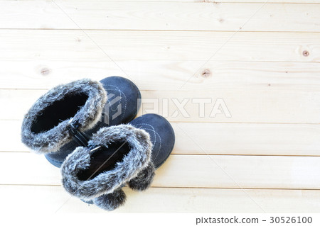 Shoes of baby or child on wood table top view 30526100