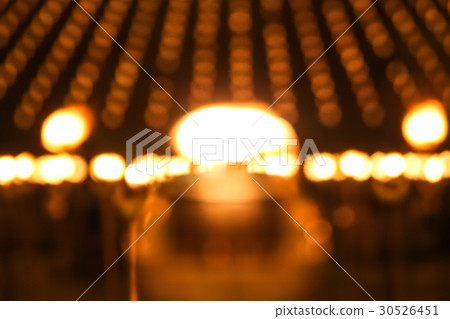 Blurred candle to pay respect to lord buddha Blurred candle to pay respect to lord buddha 30526451