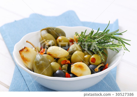 pickled olives, capers, caper berries and garlic 30527386