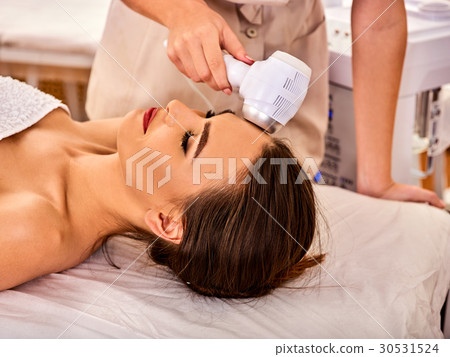 Ultrasonic facial treatment on ultrasound face 30531524