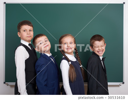 elementary school boy near blank chalkboard elementary school boy near blank chalkboard 30531610