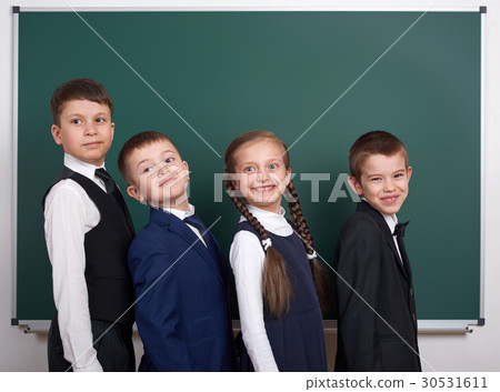 elementary school boy near blank chalkboard elementary school boy near blank chalkboard 30531611