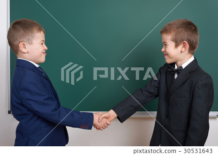 elementary school boy near chalkboard elementary school boy near chalkboard 30531643