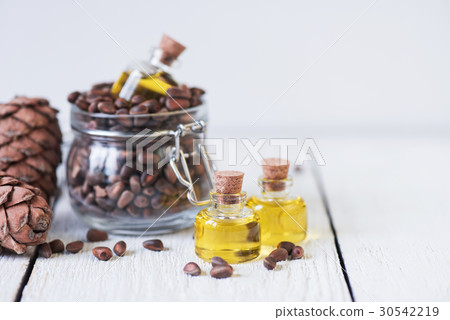 The cedar oil in a glass bottle The cedar oil in a glass bottle 30542219