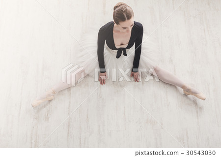 Classical Ballet dancer in split crop, top view 30543030