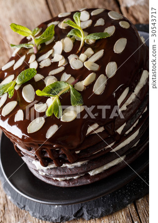 Delicious chocolate cream cake with whipped cream Delicious chocolate cream cake with whipped cream 30543717