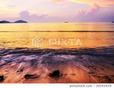 Sea sunset or sunrise in twilight golden water 30543859