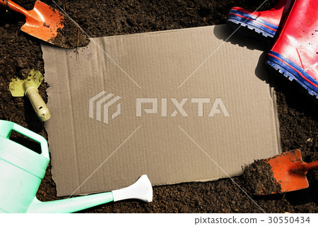 Paper placard is on a soil Paper placard is on a soil 30550434