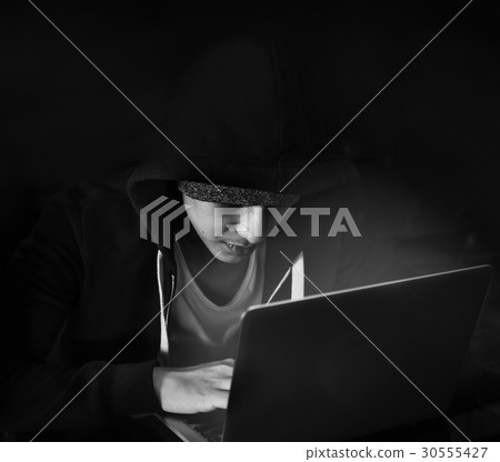 Young asian boy wearing hoodie using digital laptop 30555427