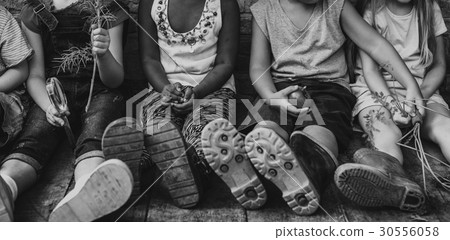Group of kindergarten kids friends holding magnifying glass for explore Group of kindergarten kids friends holding magnifying glass for explore 30556058