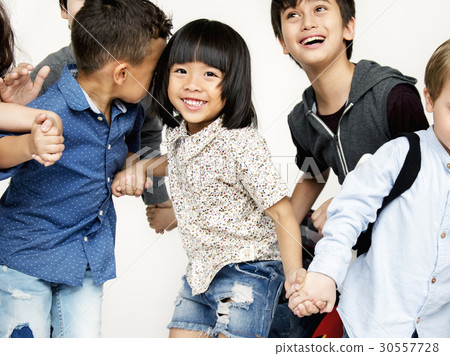 Group of kids celebrate party fun together Group of kids celebrate party fun together 30557728