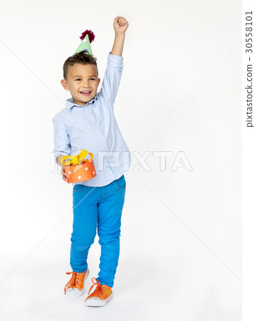 Happiness little boy smiling with gift box studio portrait Happiness little boy smiling with gift box studio portrait 30558101