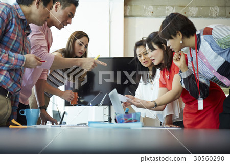 A group of people is debating a new plan. A group of people is debating a new plan. 30560290