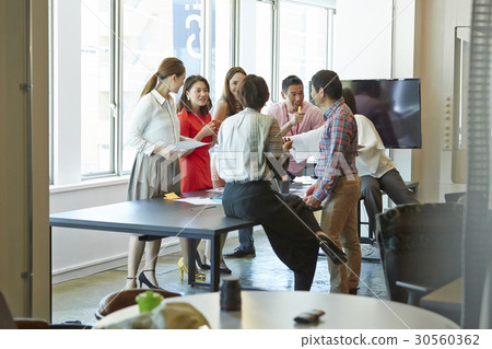 a group of people is in a meeting. a group of people is in a meeting. 30560362
