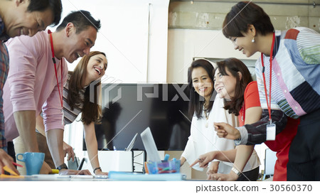 A group of people is smiling A group of people is smiling 30560370