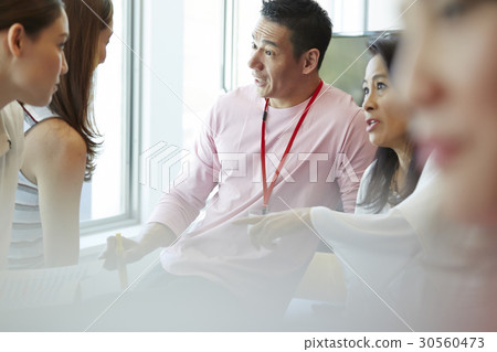 Colleagues sharing idea in business plan together 30560473