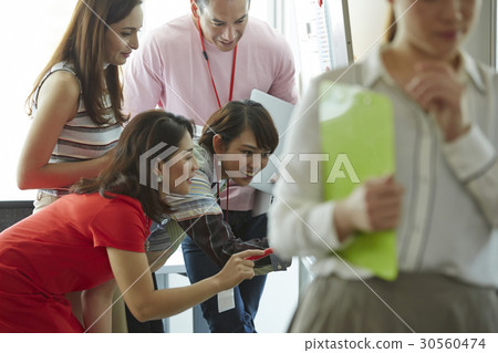 Four of five people are happily discussing Four of five people are happily discussing 30560474