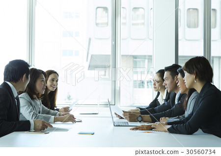 a portrait of a team meeting a portrait of a team meeting 30560734