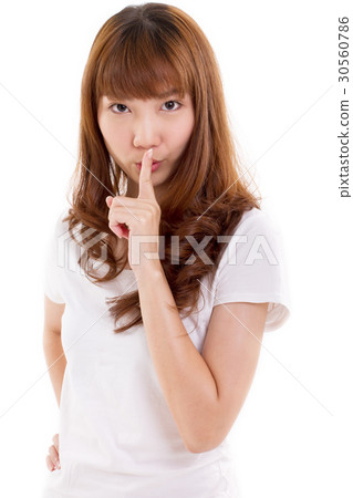 woman showing silence hand sign woman showing silence hand sign 30560786
