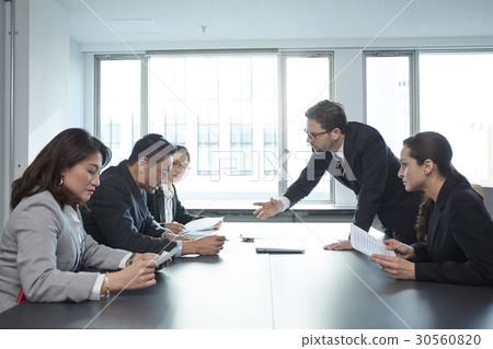 a portrait of a team discussion 30560820