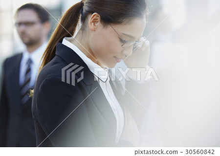 a portrait of a woman looking down a portrait of a woman looking down 30560842