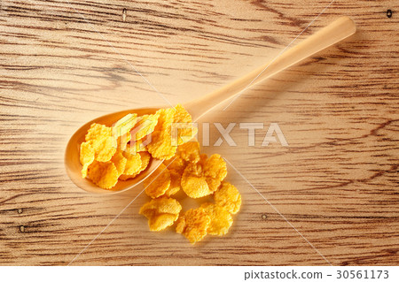 Wooden spoon with corn flakes 30561173