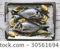 Fresh Dorado fish with lemon and rosemary 30561694