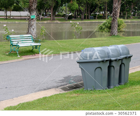 Trash bins at outdoor park 30562371