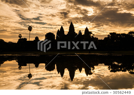Angkor Wat temple at dramatic sunrise reflecting 30562449