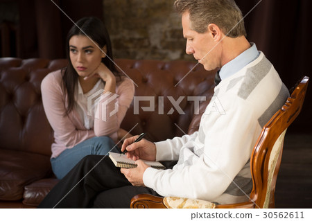 Young woman at psychologist's office 30562611