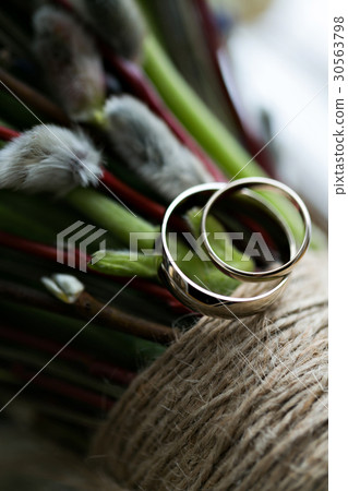 Wedding bouquet and rings. The concept of marriage 30563798