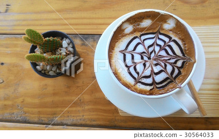 cup of cappuccino on the wooden table background 30564033