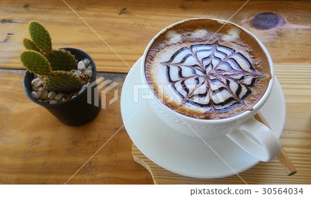 cup of cappuccino on the wooden table background 30564034