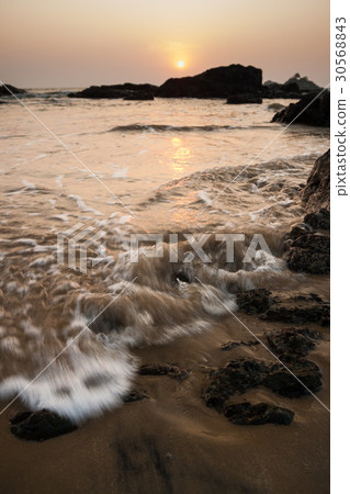 Sunset at om beach india 30568843