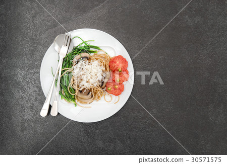 Spaghetti mushrooms vegetables Food background Spaghetti mushrooms vegetables Food background 30571575