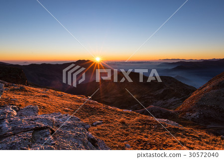 Mountain range at sunset Mountain range at sunset 30572040